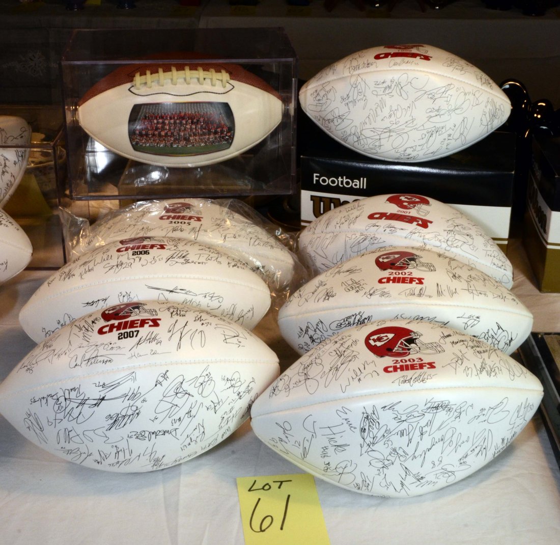 Kansas City Chiefs Wilson Team Balls Lot: This lot includes:1999, 2001, 2002, 2003, 2004, 2005, 2006, 2007. One ball in in plastic display for football.