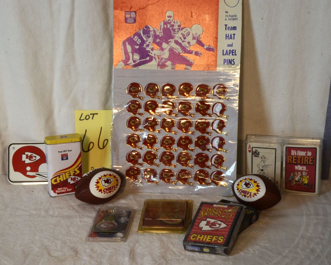 KC Chiefs Lot of Smalls: A: Sheet of Richards & Sargent Team Hat and Lapel Pins - new still on sheet - 36 pins all unused. B: Two Chiefs football shaped OrnamentsC: Chiefs NFL concord licensed key holder/ring - new in package