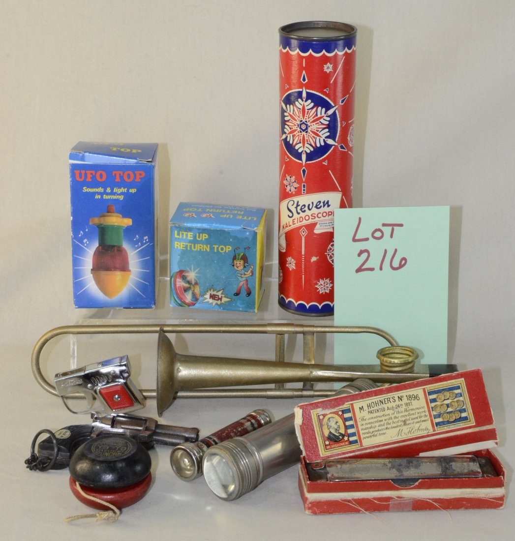Vintage Lot of Toys Harmonica Flashlights Horn: Tin slide tuba, Steven kaleidoscope 1940s, UFO Top sounds and light up in turning in original box, Lite up return top in original box, Duncan wooden beginners yo-yo, Hohners No 1896 harmonica,Gun Room