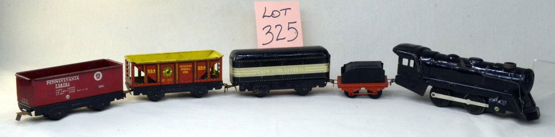 Vtg Marx Tin Toy Railroad Train Engine & 4 Cars: Vintage Tin Marx Toy Railroad Engine and 4 cars - Engine is marked with Marx symbol on bottom and is black - apprx 9" long; Coal tender red and black apprx 3.75" long; Northern pacific Yellowstone Par
