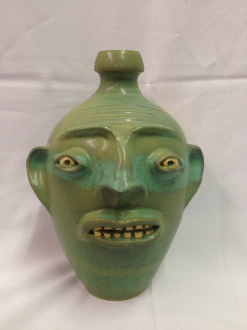 NC Face Jug Signed Randy- Green/Blue: NC Face Jug Signed Randy Tobias- Green/Blue. 10 1/4".