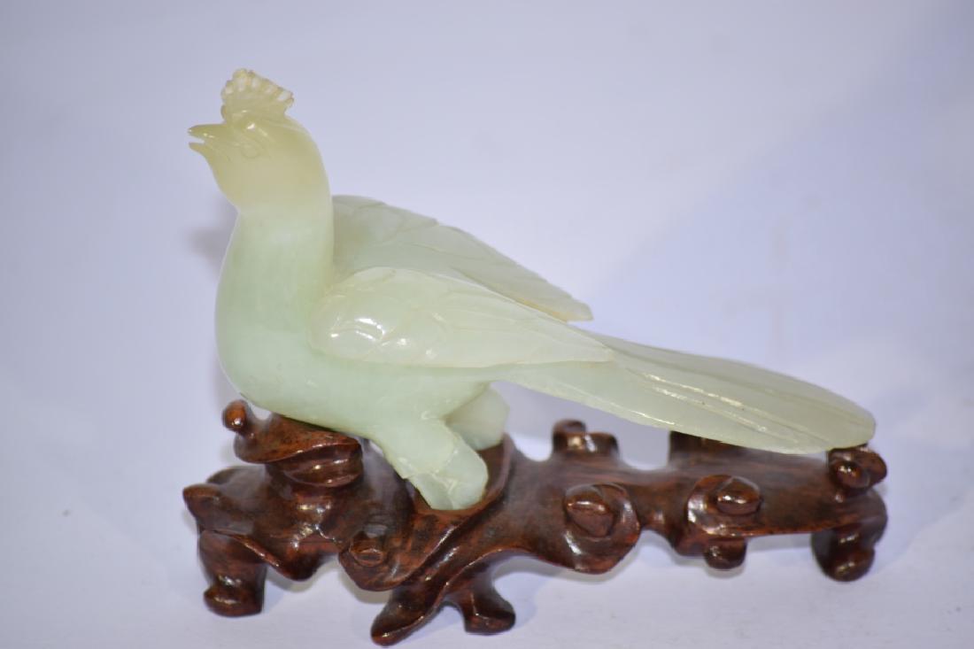 Chinese Jade Carved Bird: Chinese jade carved bird. 4.5in. One feet has an old repair.