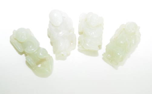 Four Qing Chinese Greenish White Jade Boys: Four Qing Chinese greenish white jade boys. Size varies. Age wear.