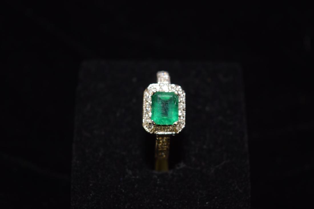 18K White Gold Emerald with Diamond Ring: 18K white gold emerald with diamond ring. Age wear.