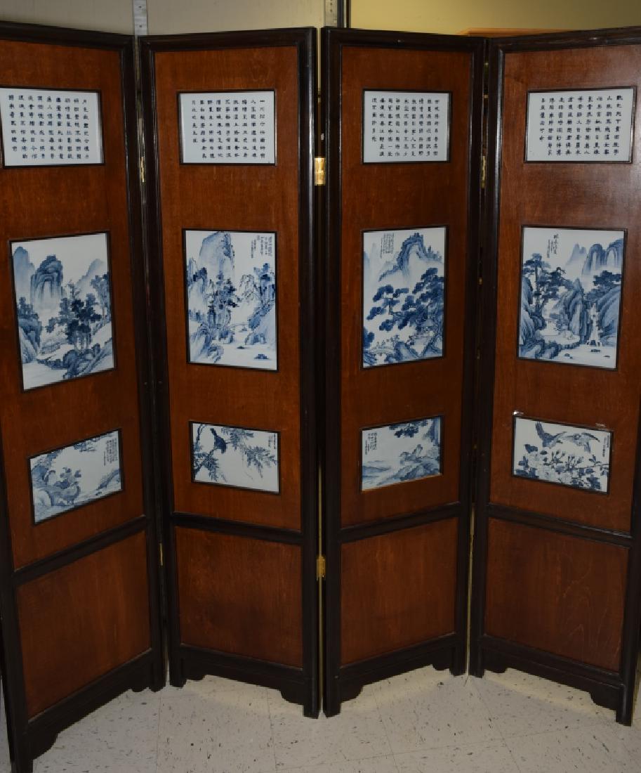 Chinese B&W Porcelain Plaque Inlaid Wood Screen: Chinese blue and white porcelain plaque inlaid wood screen. 72in by 72in. Age wear.
