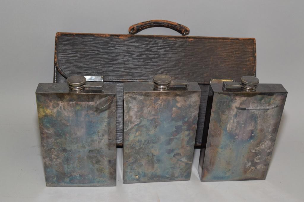 Set of Shreve & Co. Silverplated Flasks: Set of Shreve & Co. silverplated flasks. 9.5in by 17in.