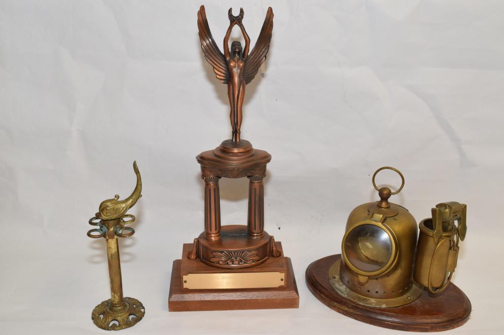 Group of Bronze Decor inc. a Best Supporting Actor: Group of bronze decor including a best suporting actor trophy.