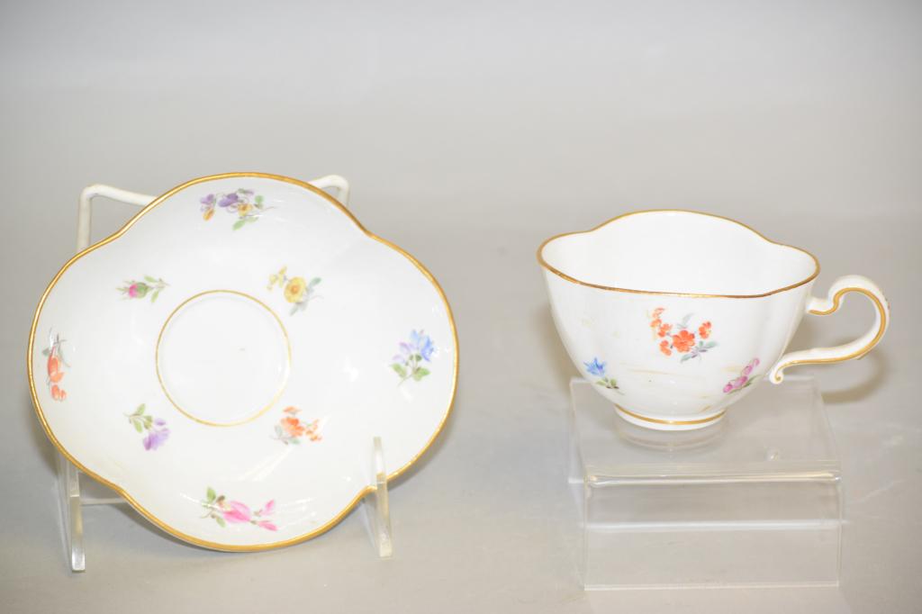 Meissen Germany Porcelain Floral Tea Cup and Sauce: Meissen Germany porcelain floral tea cup and saucer. 5.5in.