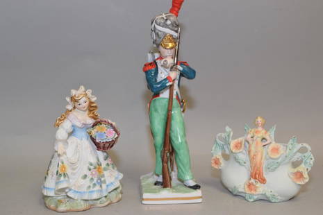 Lefton Porcelain Figurine and European Soldier Figurine: Lefton porcelain figurine and European soldier figurine (marked) and other. 11.5in.