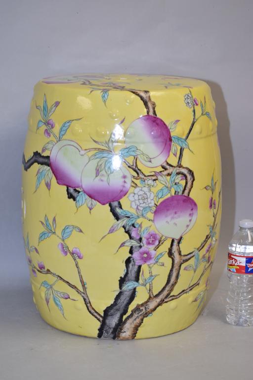 19-20th C. Chinese Porcelain Yellow Glaze Famille Rose: 19-20th C. Chinese porcelain yellow glaze famille rose peach garden seat. 18in.