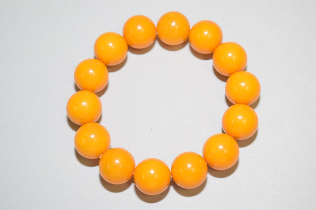 Faux Butterscotch Egg Yolk Amber Bead Bracelet: Faux butterscotch egg yolk amber bead bracelet. 2.75in.