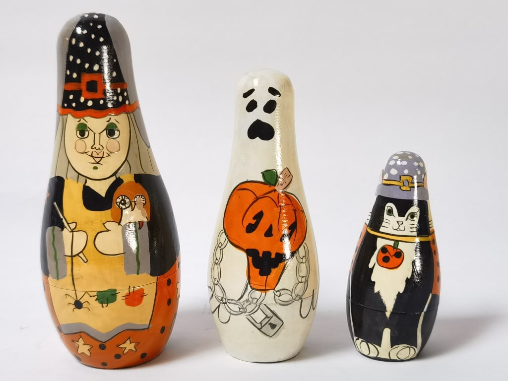 Vintage Russian Hand Painted Nesting Dolls (1 of 2)