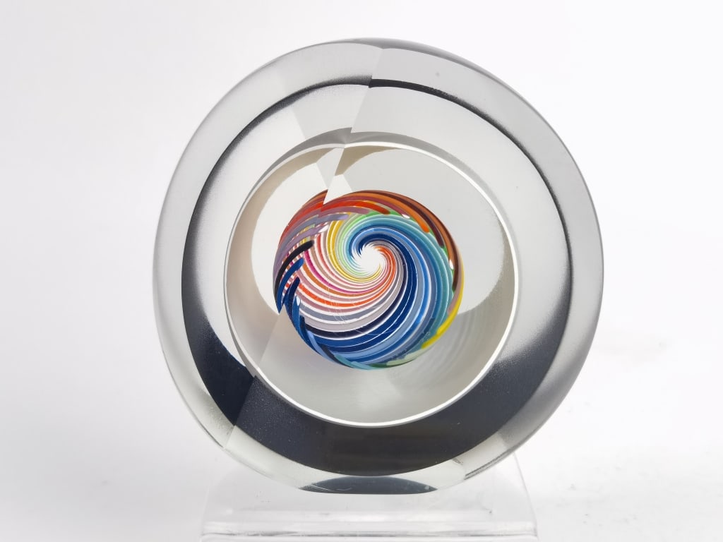 Vintage MCM Rainbow Stripe Black Circular Art Glas: Vintage MCM Rainbow Stripe Black Circular Art Glass Paperweight, 4in by 4.25in