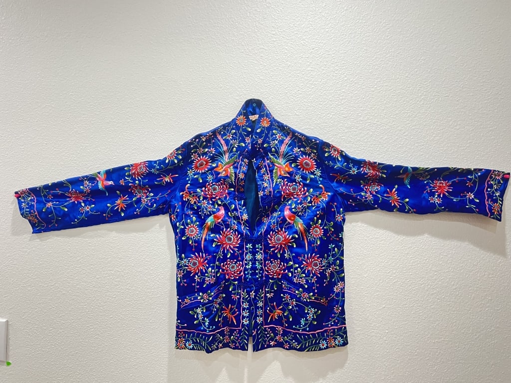 Chinese Woman's Embroidered Robe on Blue Silk: Chinese Woman's Embroidered Robe on Blue Silk, 27in by 56in
