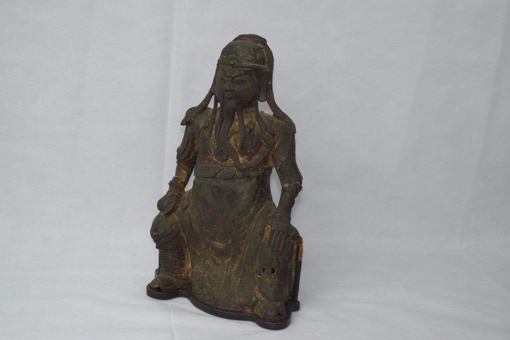 Ming Dynasty Chinese Bronze Guangong Statue: In a sitting position. Ming dynasty. Previous auctioned at Bonhams New York, September 2014 Auction, lot# 8079. Height: 10 5/8in. Condition: Small chips
