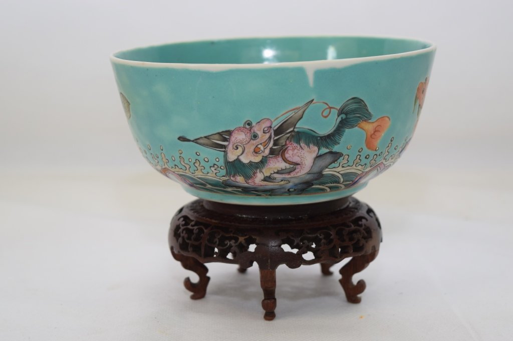 19th C. Chinese Famille Rose Bowl, DaoGuang Mark: Detailed painting of foo dogs playing in the waves. D: 6in, H: 2.5in.