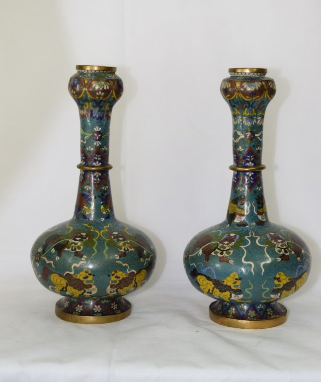 Pair of Chinese Cloisonne Vases: Chinese cloisonne vases with foo dogs. H: 16in.