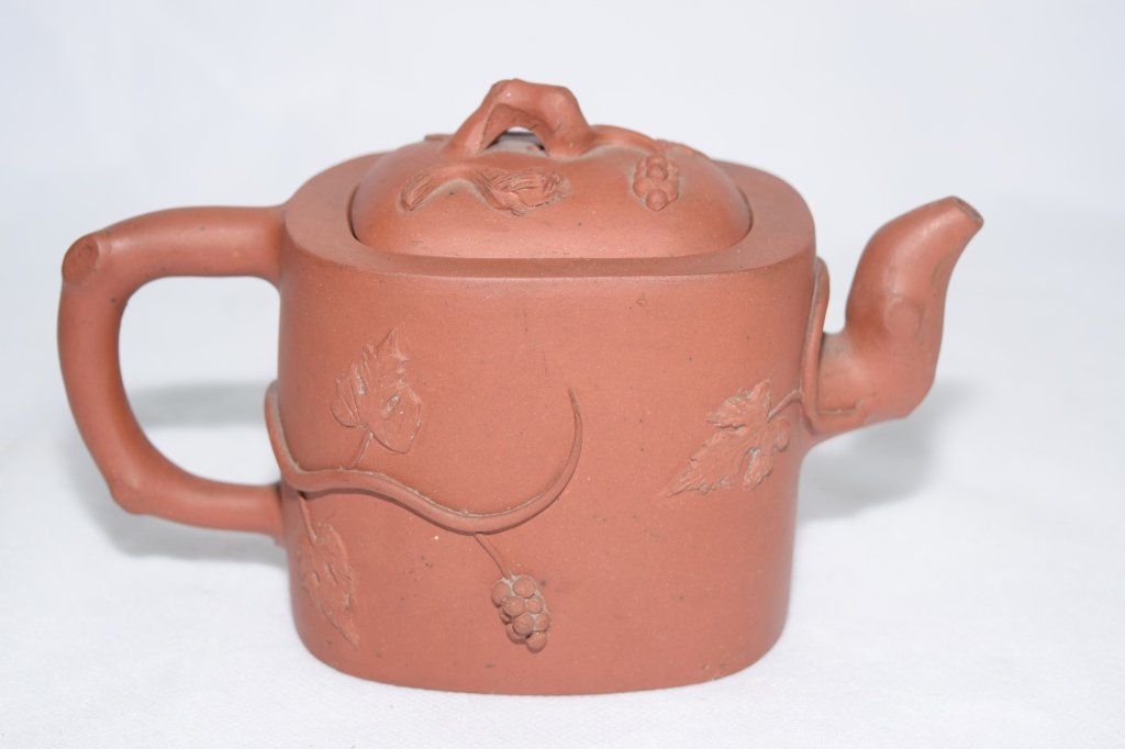 Chinese YiXing ZiSha Teapot: L: 7.5in. Chip on cover.