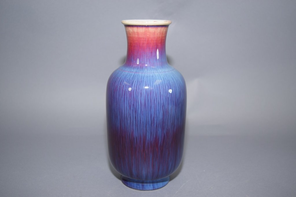 1970s-80s Chinese Flambe Style Vase: 1970s-80s Chinese flambe style vase. 10.5in. Age wear.