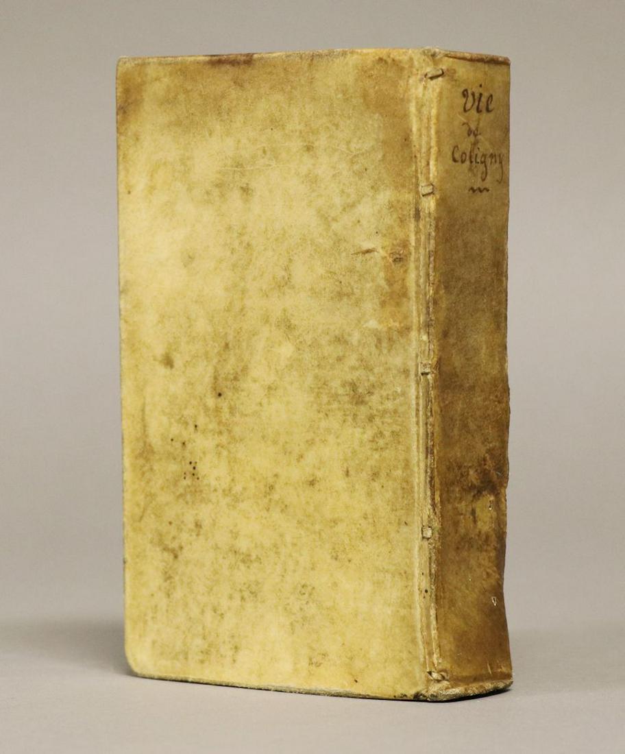 [Huguenots, French Wars of Religion]: (Courtilz de Sandras, G.) LA VIE DE GASPARD DE COLIGNY. Cologne: Pierre Marteau, 1686. 6" x 3.25". [16], 402 pp. Printer's woodcut device to title. Early vellum over boards. Front blank with early ink