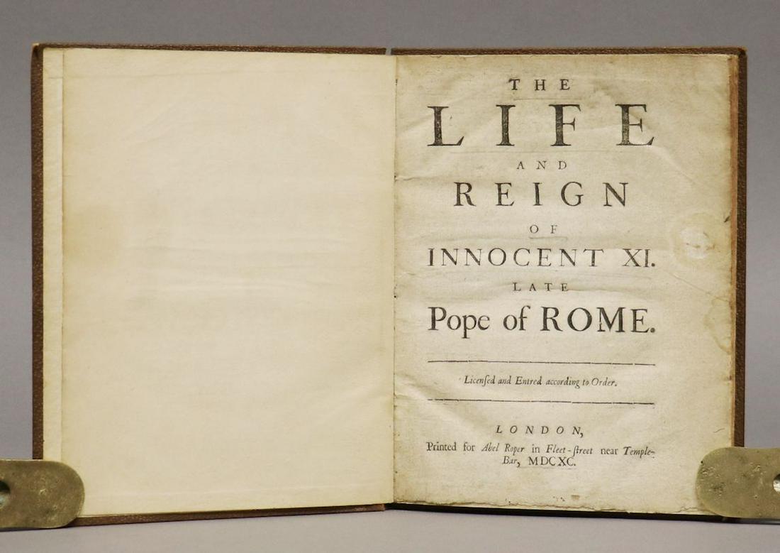 1690, Life and Reign of Pope Innocent XI: THE LIFE AND REIGN OF INNOCENT XI. LATE POPE OF ROME. London: Abel Roper, 1690. 4to. [4] 76 pp. Bound in late 19th or early 20th c. pebbled cloth. *********** The sole edition, and quite scarce in tra