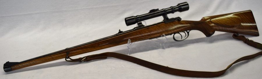 BRNO Arm's Model 22F 8mm: Serial # 10843 Mag Feed Bolt Action. This Rifle Is Scoped With 4 Power Post Type Scope with Claw Mount, Work Done By Factory Is Check Rep. Gun Has Exc. Action Of Mauser Type With Express Sight And Dou