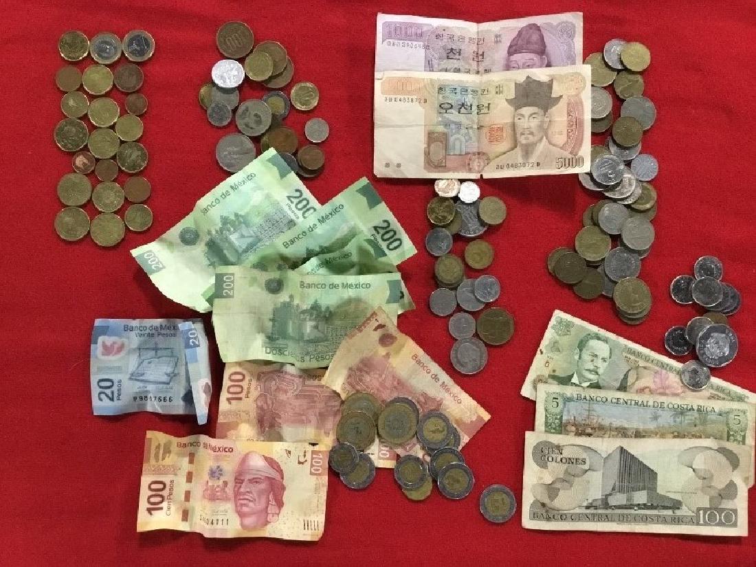 Large Lot of Foreign Coins and Paper Monies: Various conditions and dates.