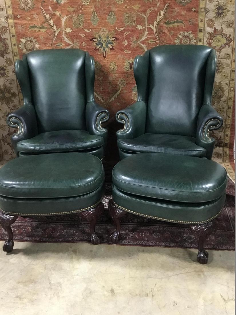 Beautiful Pair of Hancock and Moore Leather Wing Back: Brass studding on chairs, ball and claw feet. 47.5 Inches T x 34.5 Inches W.