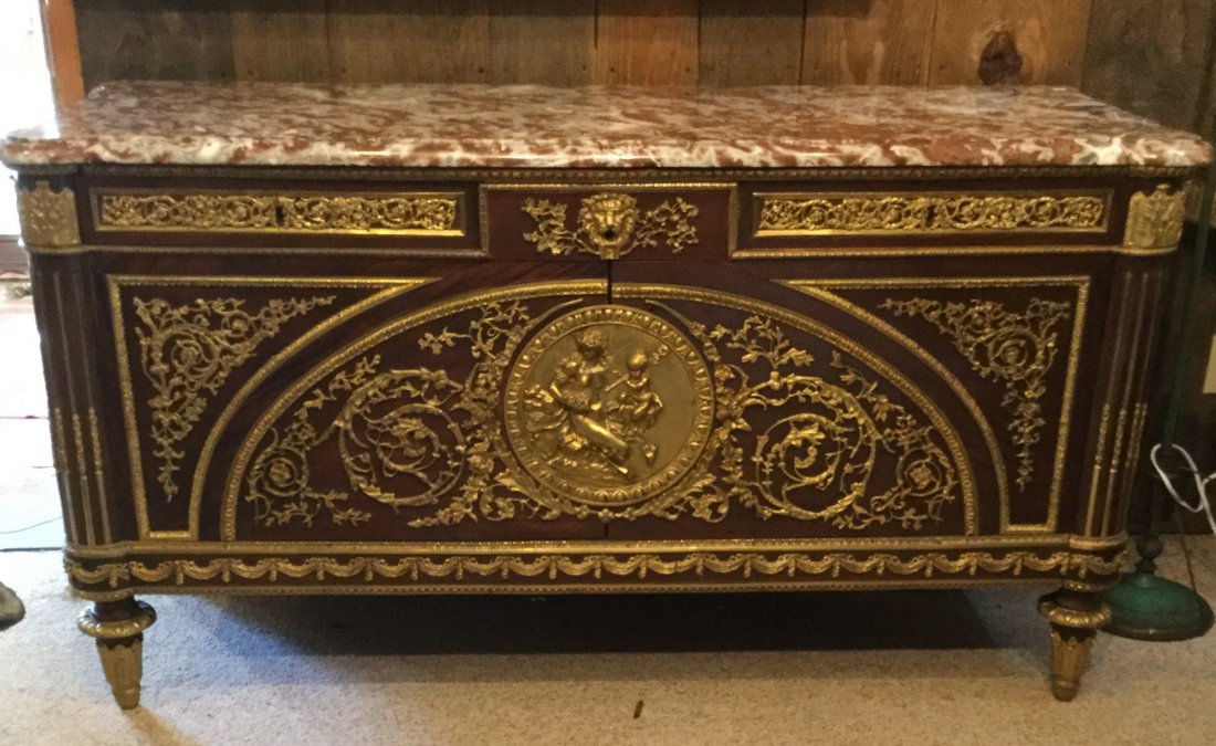 Louis XVI Commode A Vantaux After Benneman & Stockel: A Fine 19th century Louis XVI Gilt Bronze Mounted Mahogany Marble Top Commode A Vantaux, Paris circa 1890. After The Model by Guillaume Benneman & Joseph Stockel, Surmounted by a thick marble top and 