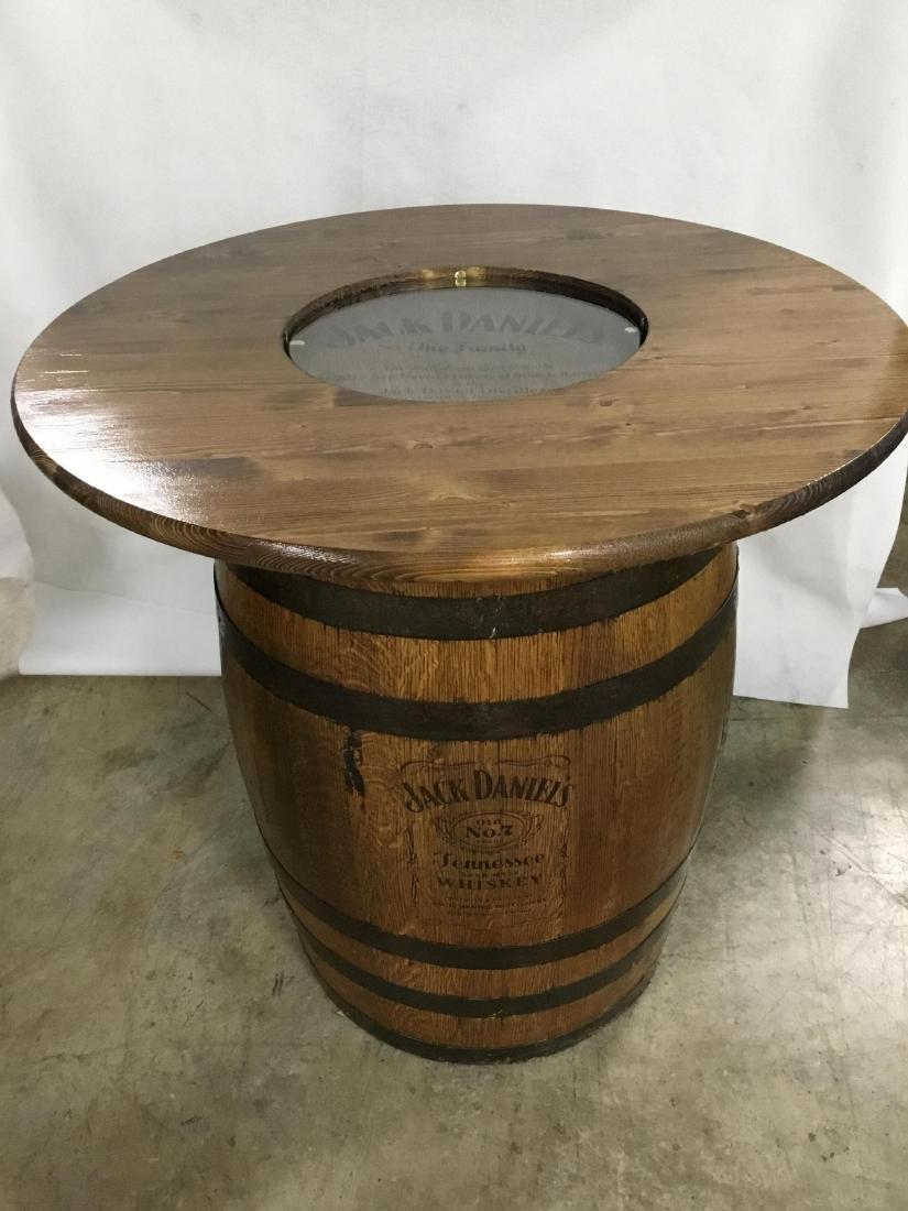 Jack Daniel Barrel Bar Table: This barrel was used to build the 2017 Jack Daniels Family of Brands Barrel Tree at the Jack Daniels Distillery, Lynchburg, Tennessee. 36 Inch D x 36.25 Inch T.