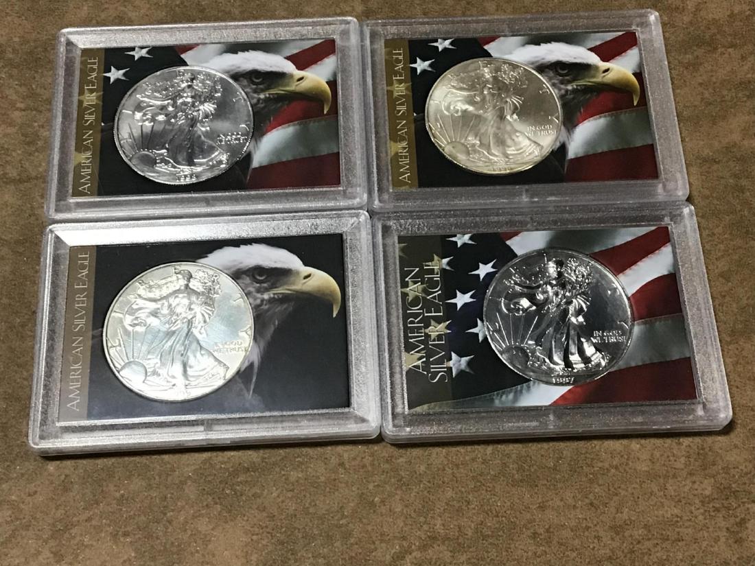 Lot of 4 American Silver Eagles (1 of 2)