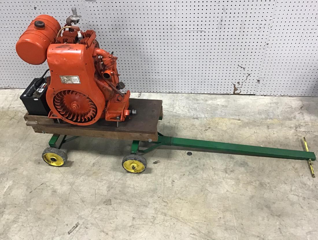 Gas Hit and Miss Engine: Engine on pull cart. In found condition.