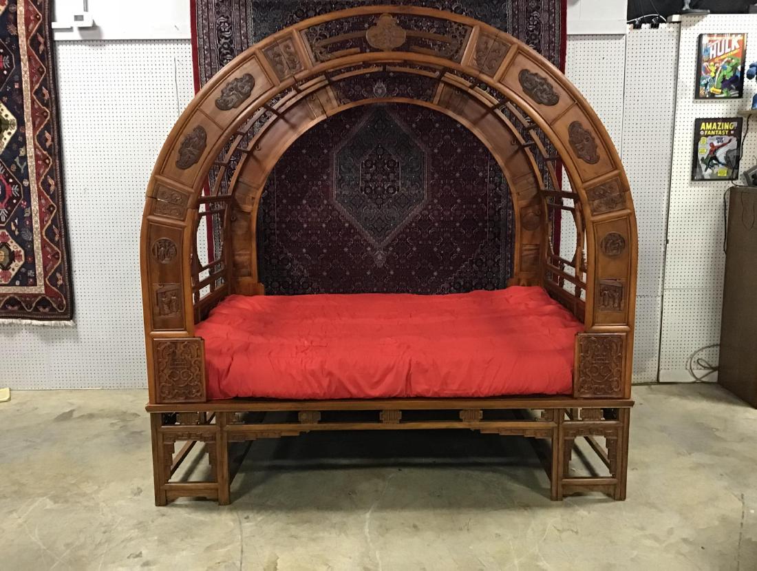 Beautiful Teakwood Chinese Wedding Bed: This beautiful bed is carved, can be taken apart easily for transport, pieces interlock like a puzzle. 86 Inches T x 86.5 Inches W x 65.5 Inches D.