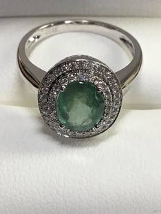 Fabulous 1.92 CT Natural Emerald and Diamond Ring: Ring is set in 14K white gold, Size 7. Has certificate of evaluation.