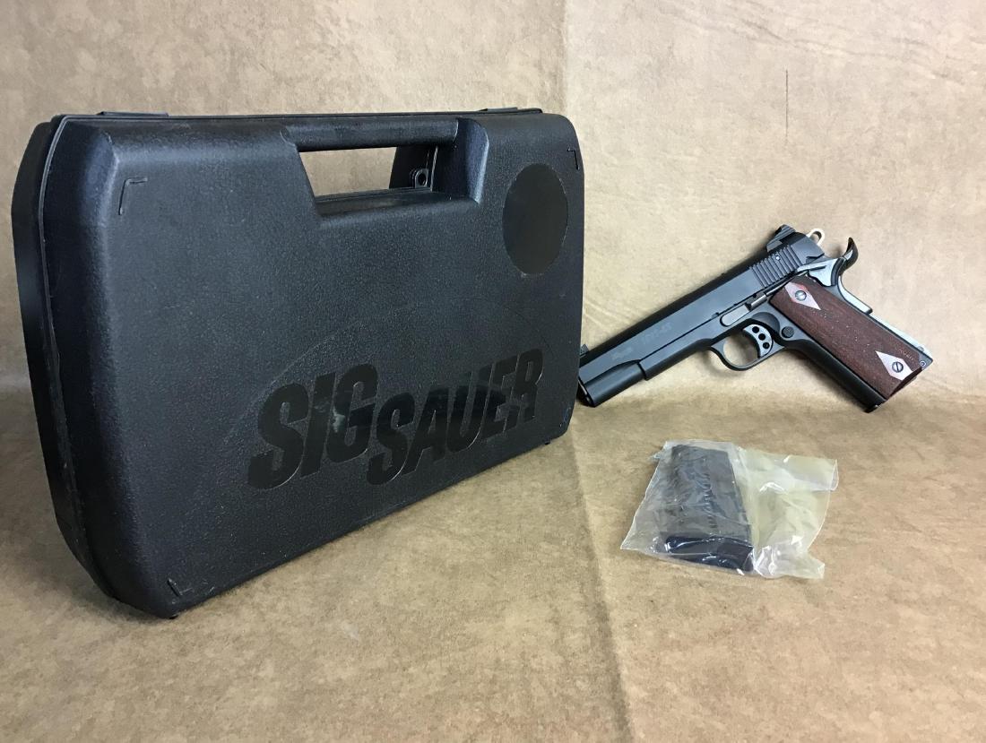 Sig Sauer 1911-22: SN T155047. NIB comes with extra magazine, hardcase, paperwork- Unfired