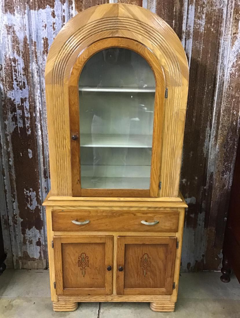 Very Unique Art Deco Solid Oak China Cabinet: Carved top, aret deco drawer pulls, good condition. 69 Inches T x 31.5 Inches W x 14.5 Inches D.