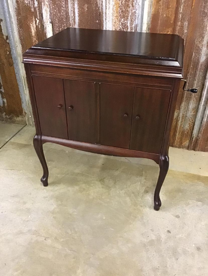 Mahogany Victrola: Very nice, in working order, Model VV 210, has storage for records and extra needles