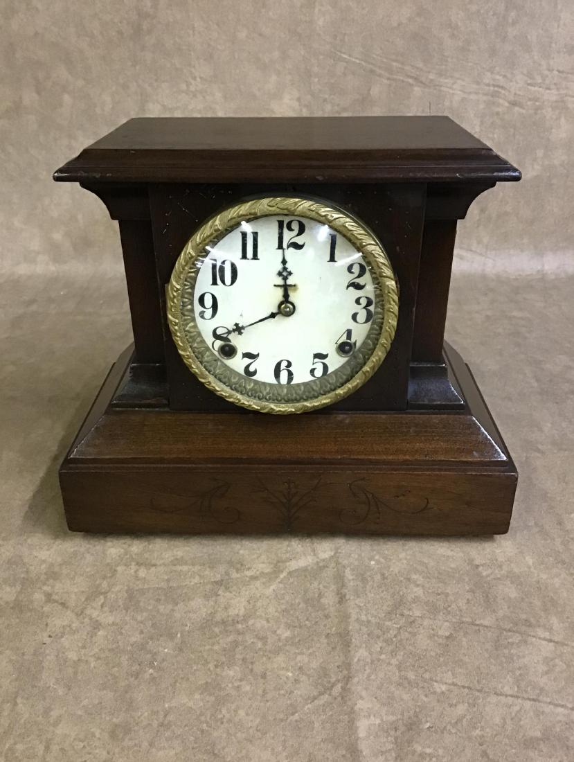 Ingraham Aldine Mantle Clock: Has lionheads, appears to be working order, has key. 12 Inches W x 10.5 Inches T
