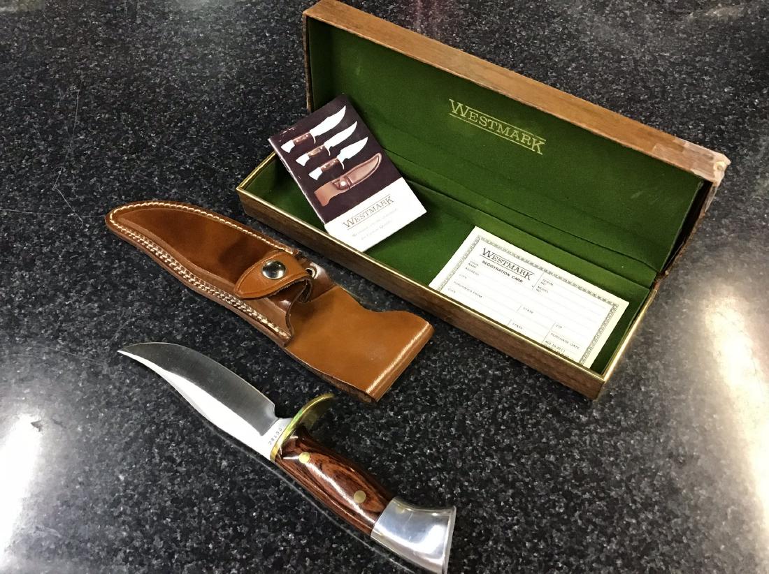 Westmark Fixed blade knife model 702: Overall length 9.5in, 5in blade. Leather sheath, in box