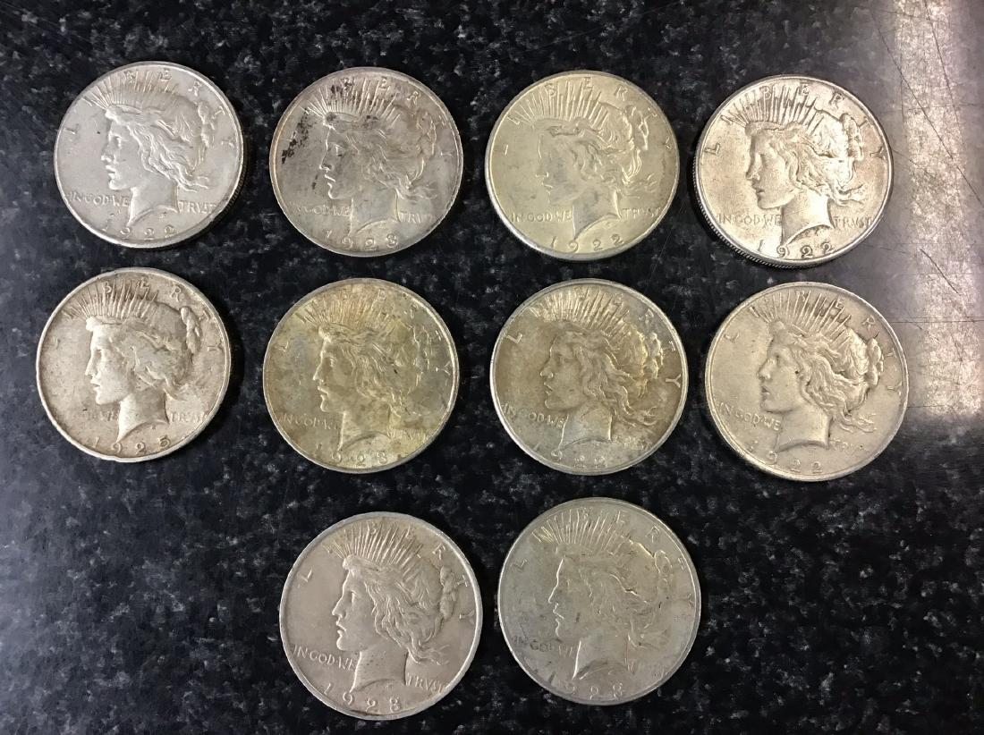 Lot of 10 Various Peace Dollars: Various mint marks and dates.