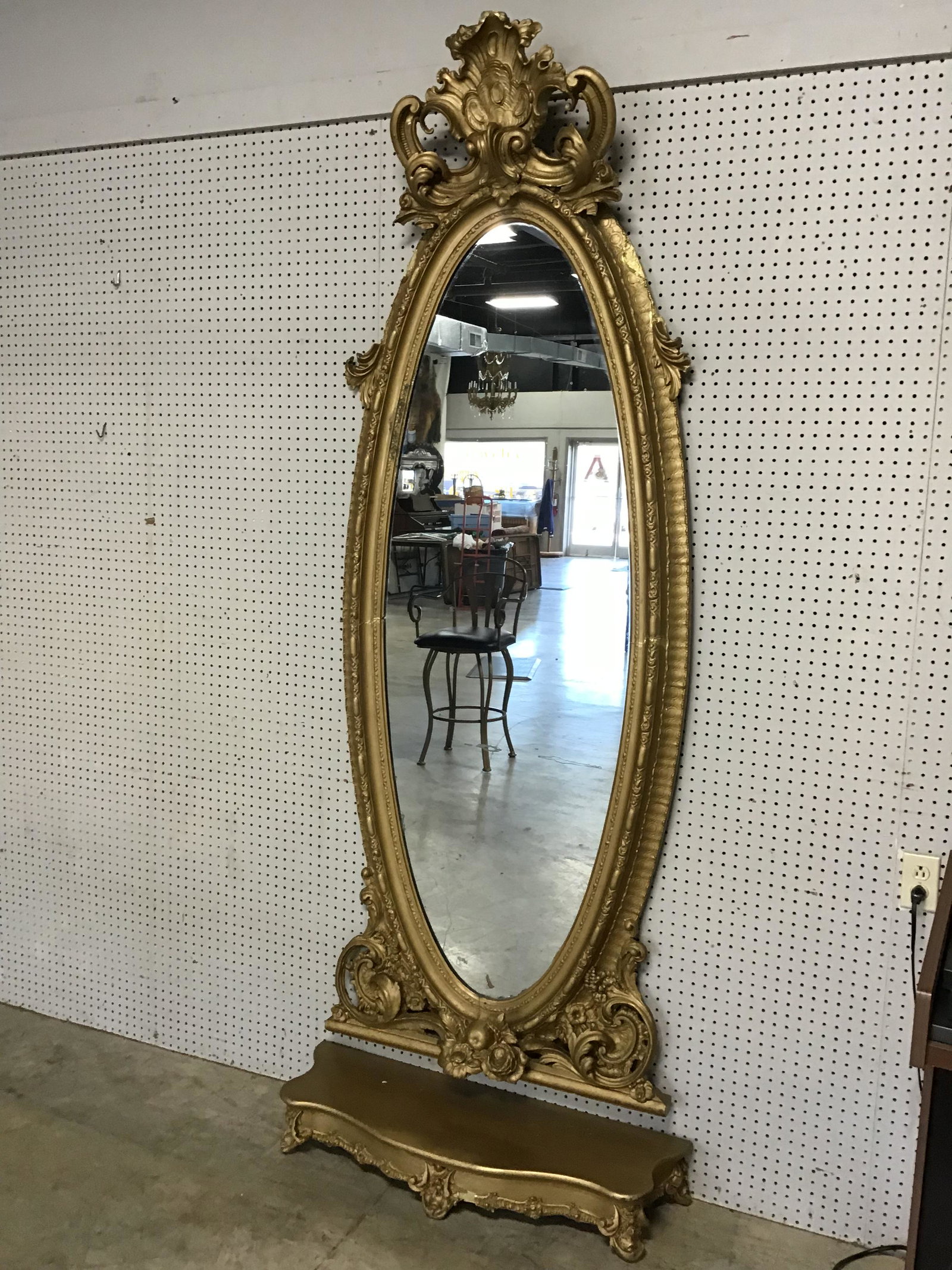 Massive Victorian Gilt Framed Pier Mirror: Extremely decorative gesso framed mirror. Mirror has some silver loss-has had damage and repairs to frame. Very beautiful mirror. Found condition