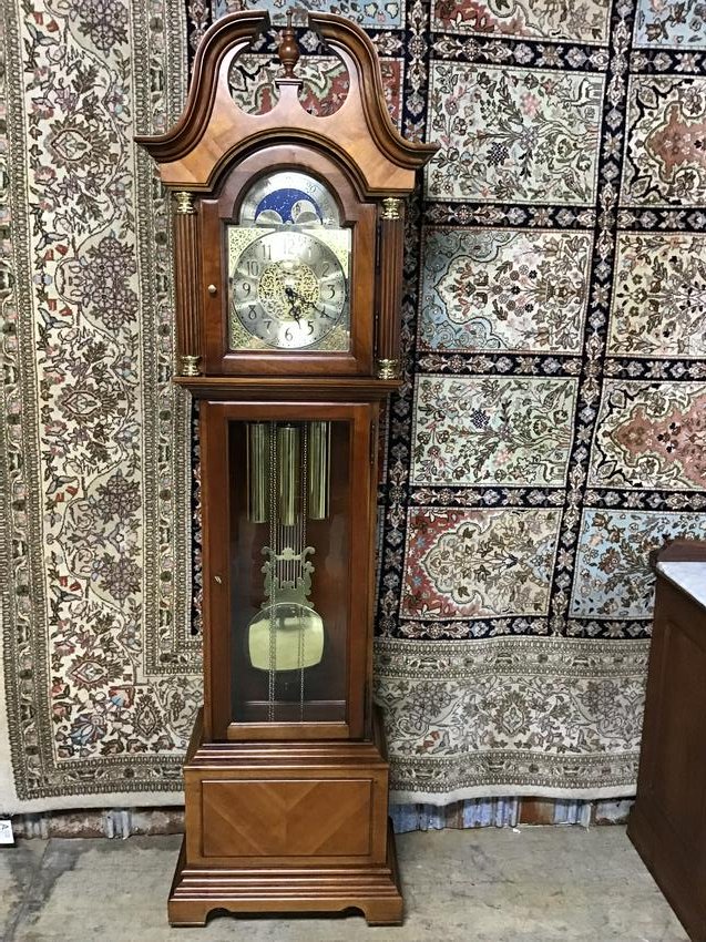 Howard Miller Grandfather Clock: Cherry Case-Has All Orginal Paperwork-Working Condition-Beautiful Chimes-Very Good Condition. 83 1/4"T X 24 1/2"W X 13 1/2"D