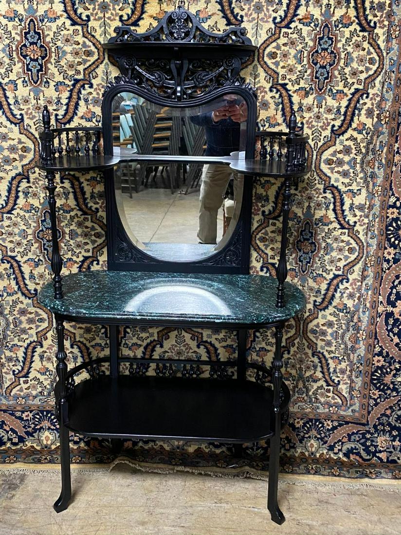 VICTORIAN ETAGERE: BEAUTIFUL HEAVILY DECORTIVE VICTORIAN ETAGERE.HAS BEVELED MIRROR. 63"T X 34"W X 16D