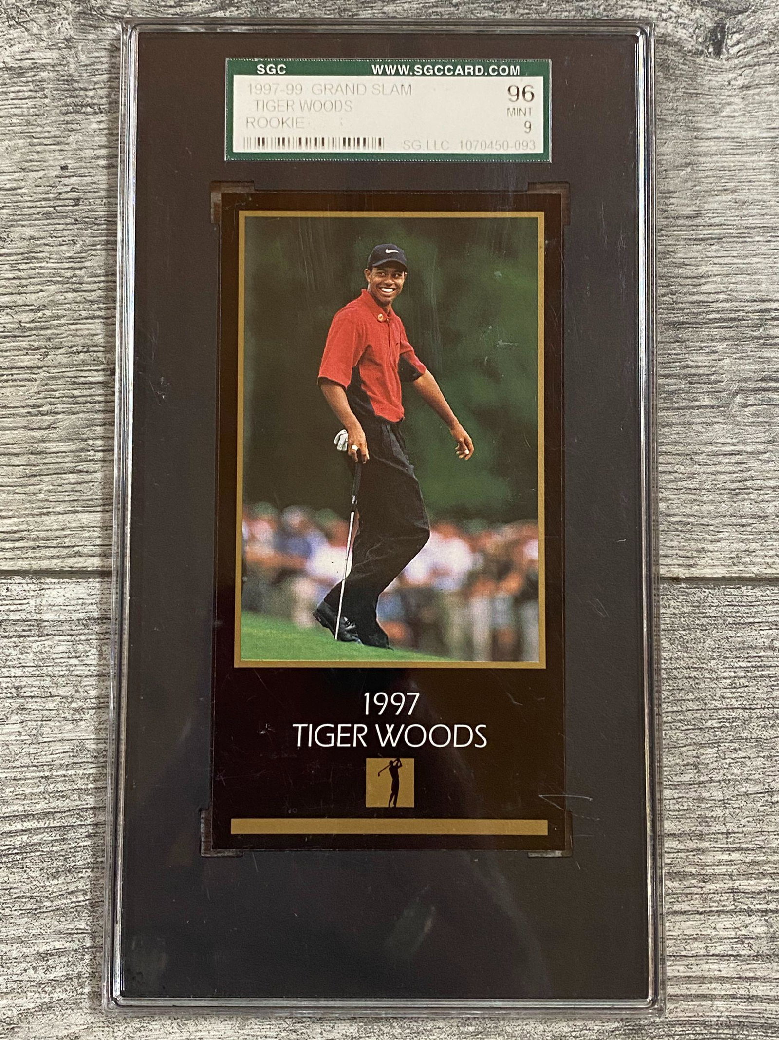 Tiger Woods 1998 Champions of Golf Rookie Card: Graded 96 Mint. SOLD AS IS. BUYER ASSUMES ALL RISKS AND RESPONSIBILITY, WE CANNOT GUARANTEE OR AUTHENTICATE