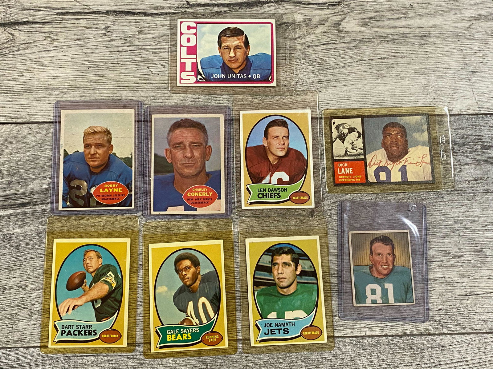 Nine star football cards and one set: 1972 Topps #165 John Unitas (EX); 1960 Topps #93 Bobby Layne (VG-EX); 1960 Topps #72 Charley Conerly (VG-EX); 1970 Topps #1 Len Dawson (VG-EX); 1970 Topps #30 Bart Starr (VG-EX); 1970 Topps #70 Walter
