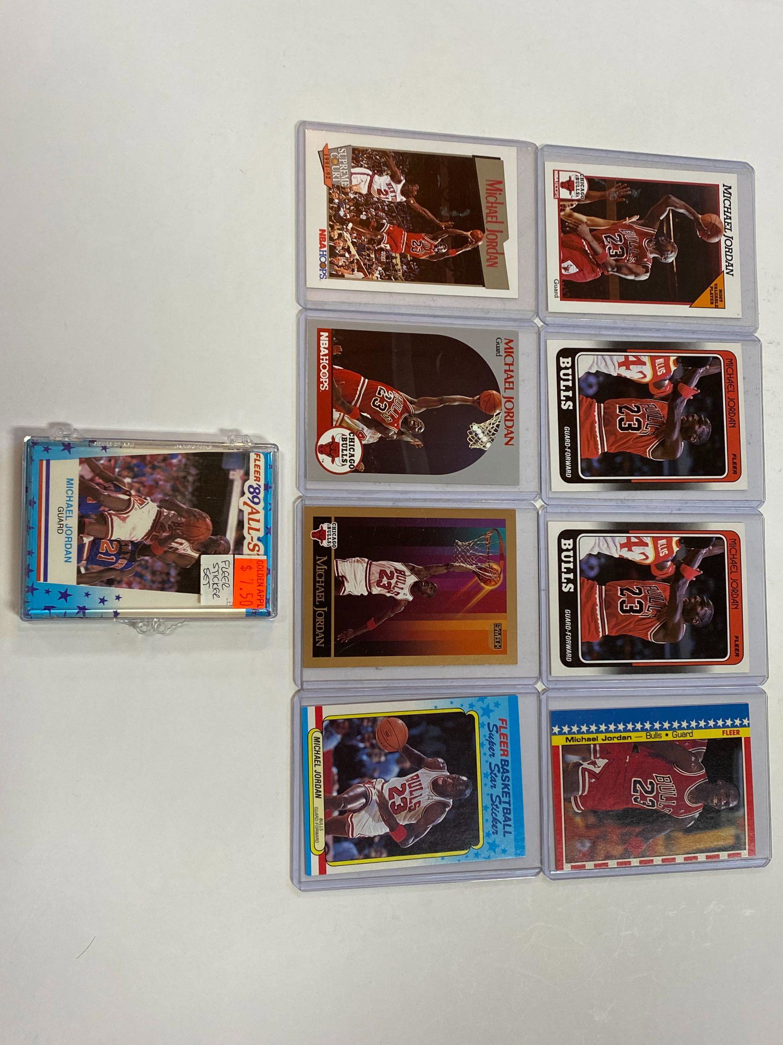 Lot of 9 Michael Jordan Cards, Early Years: Lot of 9 Michael Jordan Cards, Early Years. SOLD AS IS. BUYER ASSUMES ALL RISKS AND RESPONSIBILITY, WE CANNOT GUARANTEE OR AUTHENTICATE