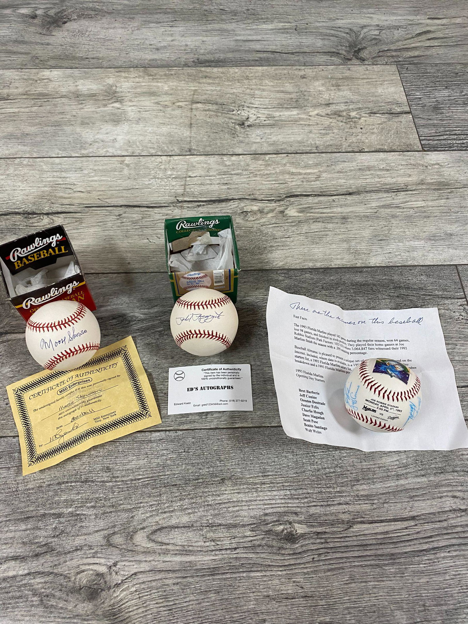 LOT OF 3 AUTOGRAPHED BASEBALLS: MOOSE SKOWRON, PHIL RIZZUTO AND 1993 MARLINS TEAM SIGNED