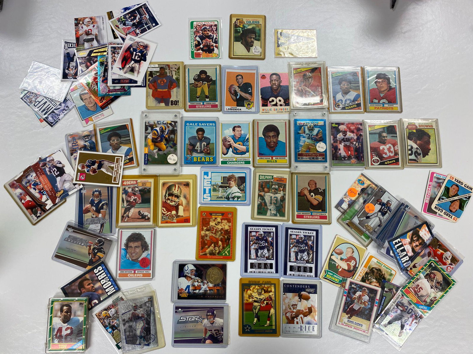 1950s-2000s Lot of Football Cards: Gale Sayers, Montana, Brady, Dickerson, Lott, and more.