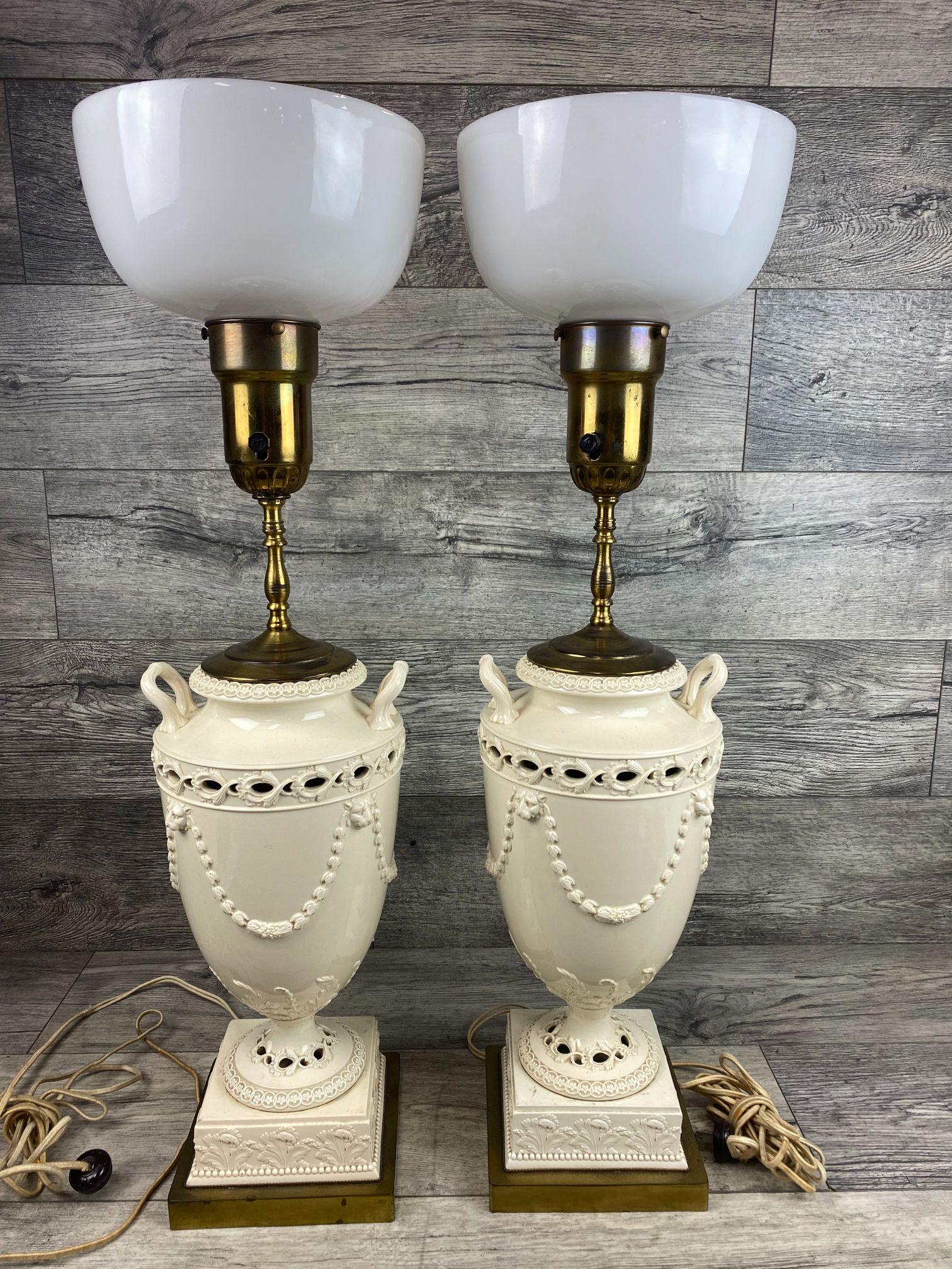 PAIR OF 19THC BLANC DE CHINE PORCELAIN TABLE LAMPS: VGC, BRASS BASE ON URNS CONVERTED TO LAMPS.Base to top of Vase approximately 17 inches.Vase approximately 13.5 inches.