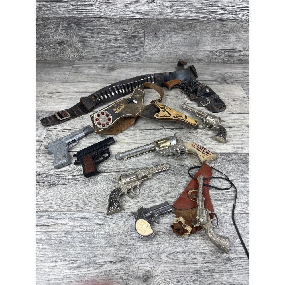 Lot of Vintage Toy Pistols: Hubley, Coyote, Fanner, etc. 8 toy guns, various conditions.